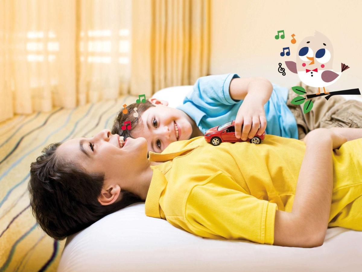 Moevenpick Villas & Residences Phú Quý Zewnętrze zdjęcie A child with autism playing with a toy car